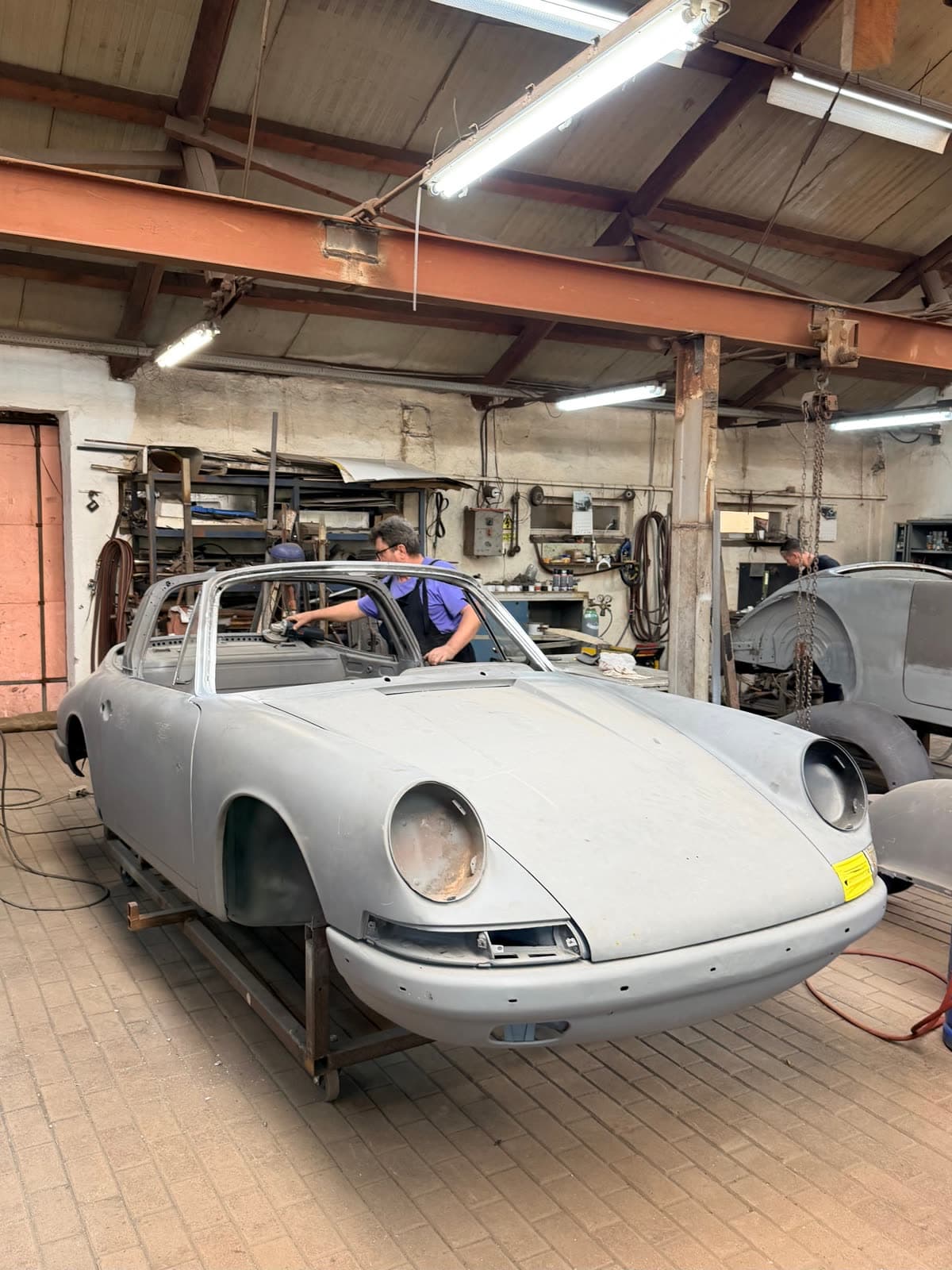Working on a 1967 Porsche 911S Targa body in the Oldtimer Studio workshop